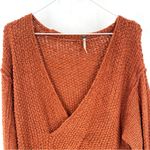 Free People  Coco Pullover V-Neck Long Sleeve Cross Knit Sweater in Terracotta Photo 3