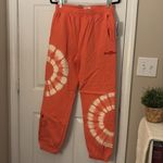 Disney NWT Mickey Mouse Genuine Mousewear Tie-Dye Jogger Pants for Adults β Size Small Photo 4