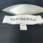 We Wore What Revolve  Black and Ditsy Daisy Romper Size XS Photo 3