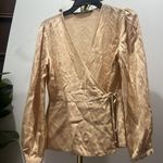 ZARA woman silk feel blouse size small
Cross over tie Photo 1