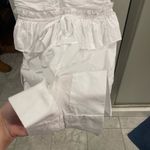 Olivaceous white halter tie romper with cutouts Photo 5