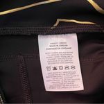 Nike  Women's‎ Icon Clash Fast Dri-Fit Black and Gold Leggings Size Small | EUC Photo 5