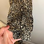 Urban Outfitters  | Cheetah Twist Front Crop Top Photo 3