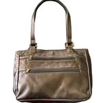 SAS Gorgeous leather metallic look handbag, hand sewn, two front zip pockets, two main compartments, one zipper compartment and one snap closure compartment, inside zip pocket, amazing condition, no flaws, measures 11x8x2 inches Photo 0