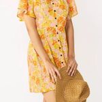 Rewind Button Front Flutter Sleeve Skater Dress
in orange and yellow florals Photo 1