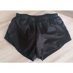Nike Women's Black Dri Fit Tempo Embossed Running Shorts Zipper Pocket Small Photo 0