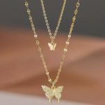 Dainty Butterfly Necklace for Wmen Sparkling Crystal Butterfly Pendant Necklace This elegant gold butterfly necklace adds a touch of sophistication to any outfit. Perfect for any occasion. Photo 4