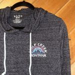 Blue 84 Wolf Creek Montana lightweight hooded graphic sweatshirt Photo 1