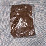 SKIMS y2k bodysuit, white bodysuit, ribbed top, minimalist, streetwear, basics, clean girl aesthetic. Photo 2