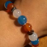 Red, White, and Blue Agate And Hematite Stainless Steel Bracelet Photo 6