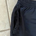 Alo Yoga Courtside Tearaway Side Snap Button Pant Women’s Size XS Triple Black Photo 6