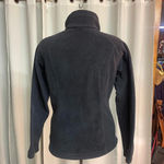 Columbia women’s black zip up size medium Photo 2