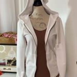 Adidas hoodie. White with rose gold lettering. Full zip. Pockets. Photo 2