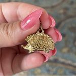 Gold Porcupine Charm Photo 0