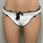 PilyQ white crochet bikini bottom with black trim. Large Photo 5