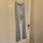 Hera Collection  Silver Sequin Flare Jumpsuit Photo 2