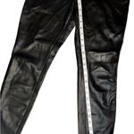 Free People faux leather pants preowned, please review photos on size. Photo 3