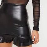 Just Quella Black Faux Leather Ruffle Hem Mini Skirt Photo 1