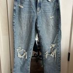 Garage Distressed Light Blue Jeans Photo 0