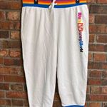 Disney Parks women cropped jogger sweatpants with rainbow trim white large Photo 0