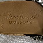 Skechers   WO 8.5 Tan and Black Slide Sandals with Geometric PatternWoven straps Photo 1