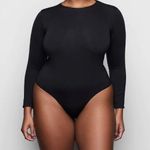 SKIMS  Essential Crew Neck Long Sleeve Bodysuit Photo 0