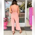 Love Riche cream raw hem jumpsuit open back tie waist women’s size medium trendy Photo 11