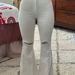 Vibrant White Flared Jeans Photo 0
