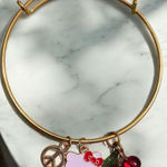 Gold Bracelet with Hello Kitty and Cherry Charms Photo 0