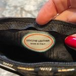 Vintage gold and black leather crossbody bag. 8x5 with‎ 24in strap. Photo 3