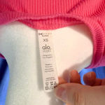 Alo Yoga  Ribbed Cinched Cropped Top Long Sleeve Knit Womens XS Pink VNeck Ruched Photo 3