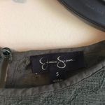 Jessica Simpson  small dark green top Photo 4