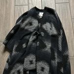 Others Follow  black and gray poncho Photo 1