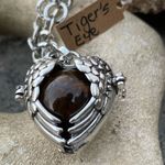 Boutique Tigers Eye stone in a heart shaped necklace cage. 36”chain Photo 8