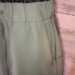 Lululemon  Athletica Green On The Fly Woven Skirt size 4 olive green skirt​​ Photo 3
