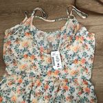 Floral ruffle romper Size M Photo 3