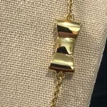 Kate Spade  Gold Tone Gold Enamel Bow Long Necklace Photo 10
