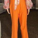 SheIn orange pants with hip cut out Photo 14