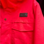 The North Face women’s hooded hyvent neon orange jacket Photo 2