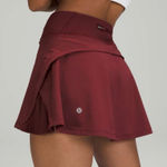 Lululemon Play Off The Pleats Mid Rise Tennis Golf Skirt Red Merlot Swift Sz 10 Photo 0