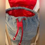 Icing Y2K light wash distressed mini backpack with American flag appliqué. NWOT Photo 1