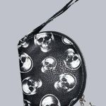 Cool black faux leather zip wristlet with white skull design! Black Photo 1