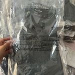 Aritzia Deep Green Sports Bra and leggings Photo 5