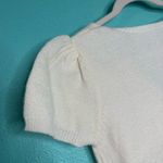 Ivory Short Sleeve V Neck Puff Sleeve a sweater top White Photo 3