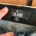LuLaRoe  Distressed Blue Jeans Photo 2