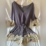 Umgee  Women’s size medium NWT long sleeve romper crochet accents Photo 0