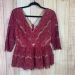Maeve Burgundy Peplum Lace Blouse with 3/4 Sleeves Photo 0