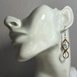 Twisted gold tone dangle faceted rhinestones earrings Photo 3