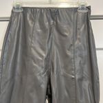 H&M  grey faux leather skinny leg pants size 4. In great condition! Photo 2