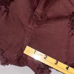 Daytrip • Distressed Capricorn High Rise Jean Shorts Burgundy Size 25 Photo 8